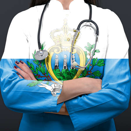 Doctor representing healthcare system with National flag of San Marinoの写真素材