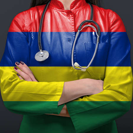 Doctor representing healthcare system with National flag of Mauritiusの写真素材