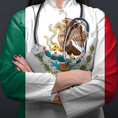 Doctor representing healthcare system with National flag of Mexicoの写真素材