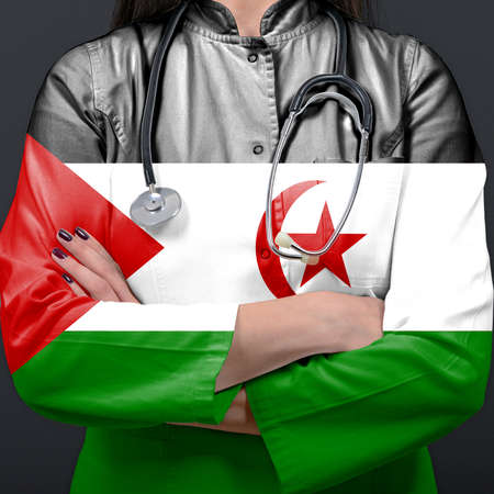 Doctor representing healthcare system with National flag of Western Saharaの写真素材