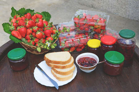 Strawberry jam and fresh breadの写真素材