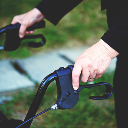 Closeup of a senior woman using walking frameの写真素材