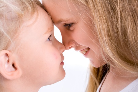 Photo of two sisters on a white backgroundの写真素材
