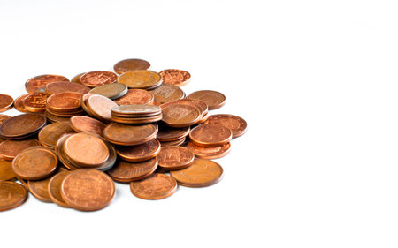 Little coins over white background