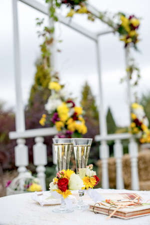 Wedding glasses with champagne. background wedding archの写真素材