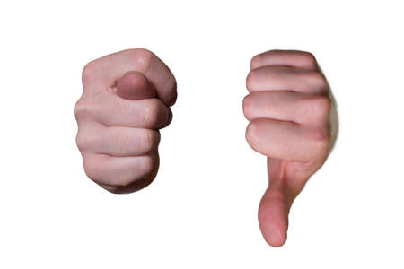 Closeup of male hands with figs and thumb down, isolated on white backgroundの写真素材