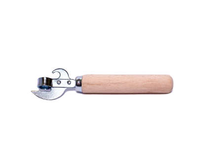 vintage can opener with the wooden handle on a white background with space for textの写真素材