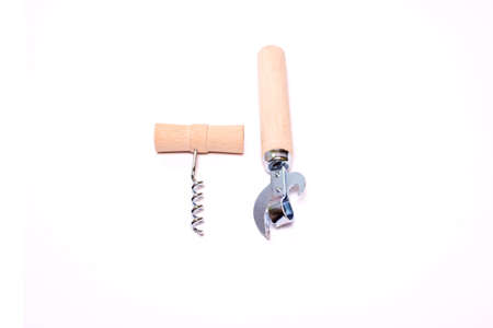 corkscrew with wooden handle and vintage can opener with wood handle isolated on white background with space for textの写真素材