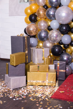 Decorated with colorful balloons decoration for photography. Photozone balls and gifts red carpetの写真素材