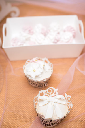 cakes in a vase on the buffet. candy bar.の写真素材