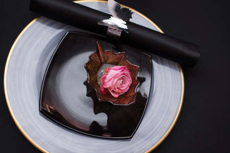 plate decorated with flowers in a restaurantの写真素材