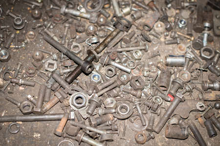 Closeup of steel screws and bolts background.の写真素材