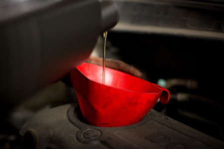 Hand mechanic in repairing car,Change the Oilの写真素材