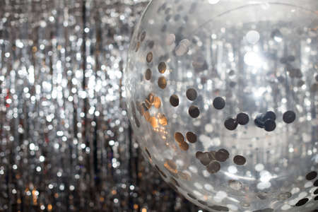 Foil balloons on the background against a shiny wall.の写真素材