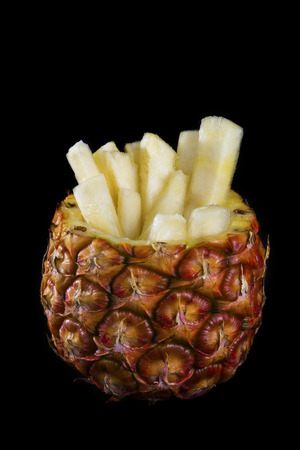 Pineapple chopped in rectangle stripsの写真素材