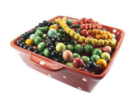 Bowl full of jewels isolated on the white backgroundの写真素材