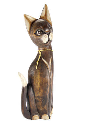 Wooden figure of a cat isolated on the whiteの写真素材