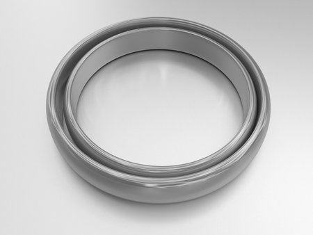 Illustration of two wedding gold rings lie lie in each otherの写真素材