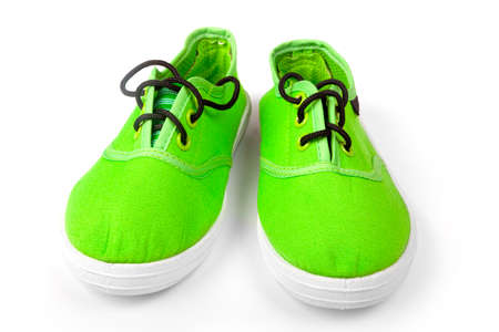 Footwear. Pair of green shoes isolated on whiteの写真素材