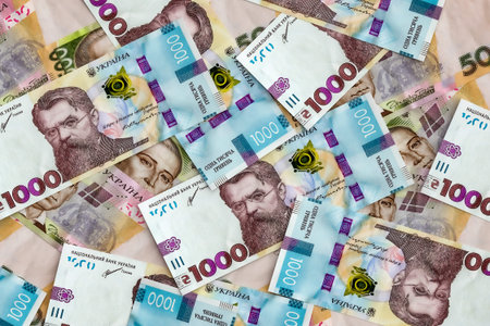 Stack of ukrainian money hryvnia (grivna, hryvna) with 1000 and 500 banknotes. Finance concept