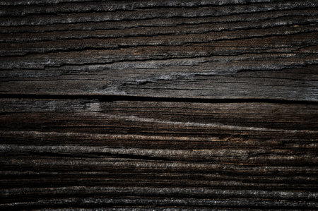 Weathered obsolete rough textured wooden board grunge backgroundの写真素材
