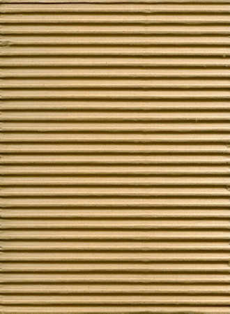 Textured corrugated striped cardboard with natural fiber partsの写真素材