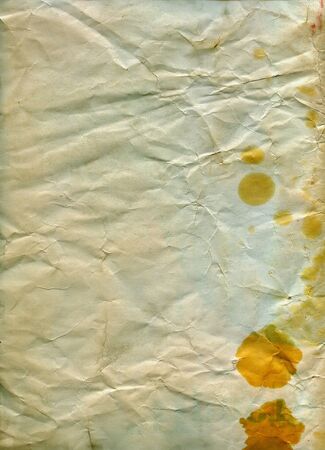 Textured stained crumpled recycled paper with natural fiber partsの写真素材