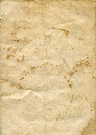 Textured aged dirty grainy paper with natural fiber partsの写真素材