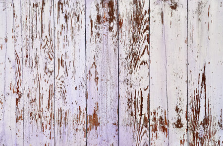 Obsolete weathered cracked painted wooden planks backgroundの写真素材