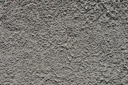 Weathered aged rough cement concrete vintage backgroundの写真素材