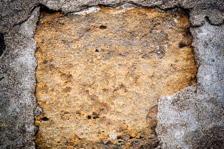 Obsolete weathered aged cracked rough cement concrete backgroundの写真素材