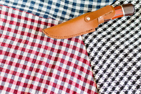 Three wool scarfs. The keffiyeh is a black, red or blue and white scarf that is usually worn around neck or headの写真素材
