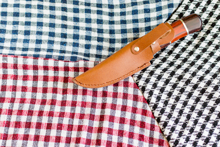 Three wool scarfs. The keffiyeh is a black, red or blue and white scarf that is usually worn around neck or headの写真素材