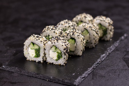 Sushi roll with cream cheese, sesame. Japanese foodの写真素材
