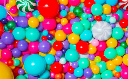Many colorful helium balloons background for holidayの写真素材