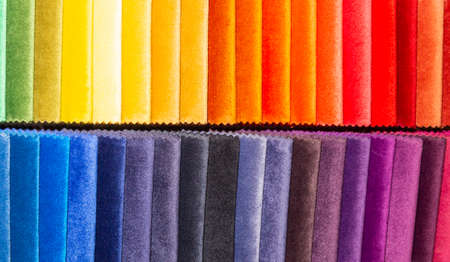 Colorful fashion fabric samples. Textile textures swatches concept. Woven fabric is any textile formed by weaving. Different colors. Clothes texture closeupの写真素材