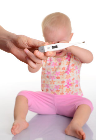 cute baby with thermometer on white background 