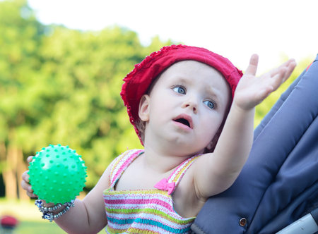 baby sitting in a pramの写真素材