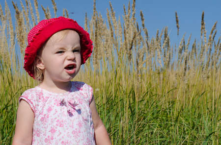 Emotional Little Girl with funny  Face Expression の写真素材