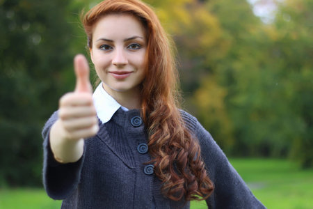 red-haired girl arm symbol