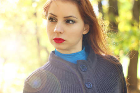 Girl autumn leaves coatの写真素材