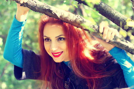 Girl autumn leaves coatの写真素材