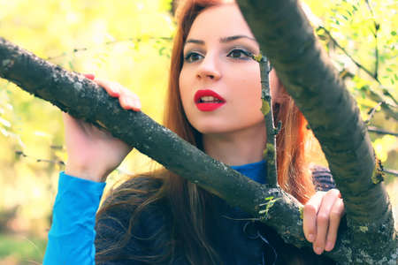 Girl autumn leaves coatの写真素材