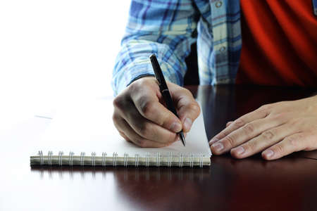 pen writing hand studentの写真素材
