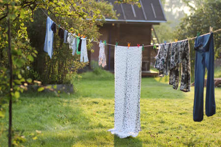 outdoor clothesline clothespin in autumn rustic landscapeの写真素材