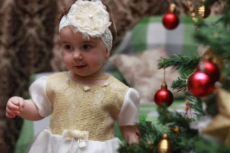 children family decorate the Christmas tree toyの写真素材