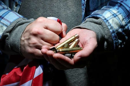 bullets on handの写真素材
