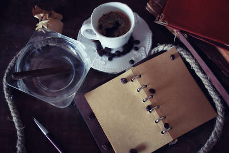 retro paper, pen,  rope and cigar on tableの写真素材