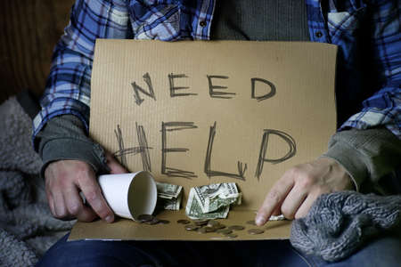 homeless man ask for helpの写真素材