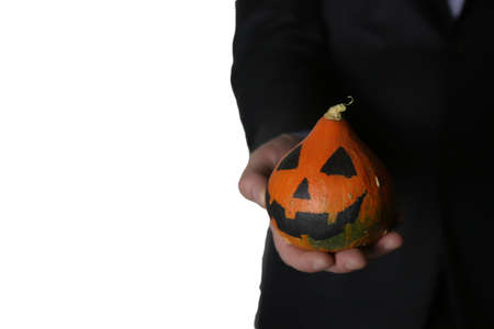 man in suit with pumpkin head, halloween conceptの写真素材